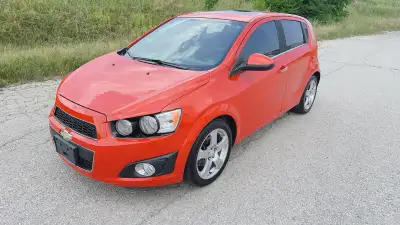 For sale certified 2012 Chevy sonic LT fully loaded with a very low mileage of 132000 with factory r...