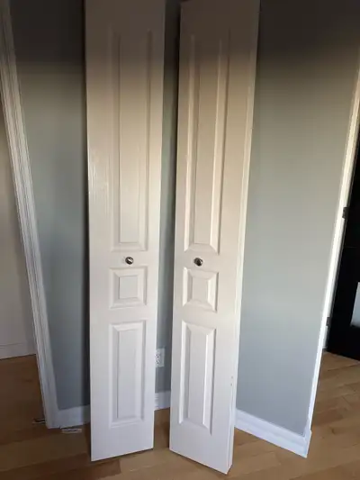 deux portes pliantes de 24po chacune , View more