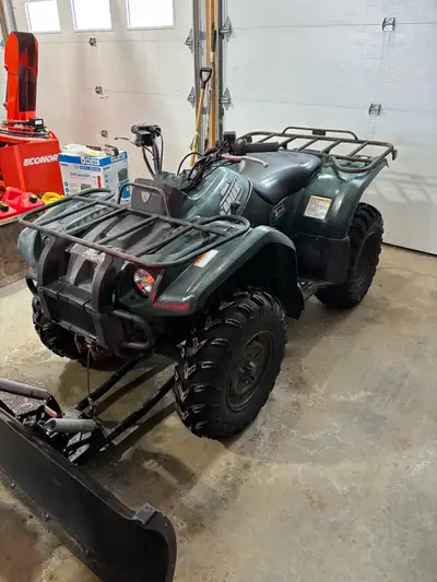 2003 Kodiak 450 with plow and heated grips. Has diff lock. Mostly used for plowing driveway
