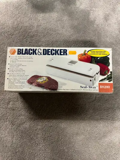 Black & Decker vacuum sealer. New condition never used. Comes in original box with a roll of sealer.