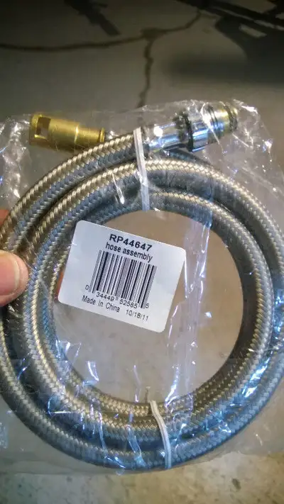Delta Faucet Pull-Out Hose Assembly RP44647 sealed package please note, there is no clip included. n...