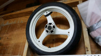 Suzuki GS500E 17"x3" single rotor Front Wheel and new tire.