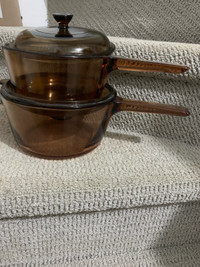  Two brown glass Pyrex pots for sale