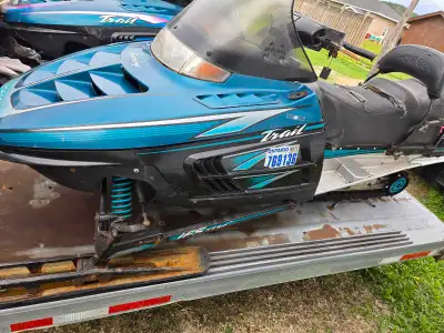 1997 Polaris indy trail touring & 1996 double wide tilt trailer for sale 488cc air cooled fuji twin,...