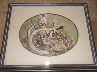 Professionally framed. Dark grey frame. The last photo was taken without a flash so the colors might...