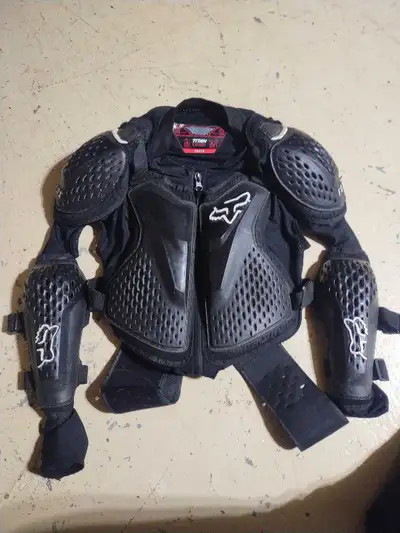 Fox dirt bike pants didn't fit size 28 waist for youth used good condition 60$ Fox chest protector w...