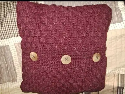 Burgundy knit pillow, View more