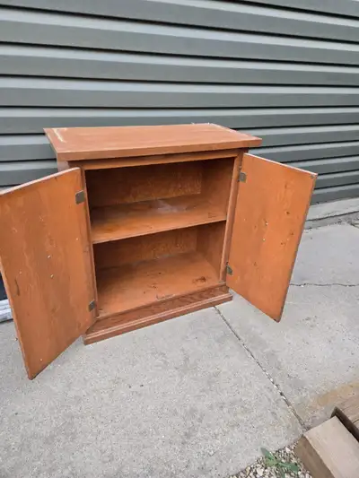 Selling Solid Wood Garage Cabinet, 34" tall x 32" Wide x 16" Deep, Nice Condition, Some Glue on Door...