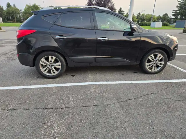 2015 hyndai Tucson 534371435419412482