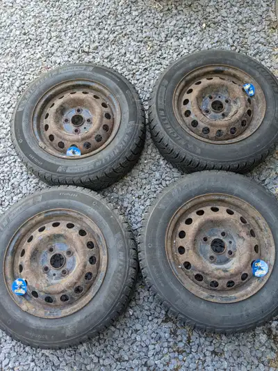 4 x Michelin 185/65 - 14 winter ice and snow tires on steel rims. Only 1 season on the road. Were on...