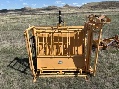 Table has automatic head catch. Three drop down branding doors to provide access to animal. The head...