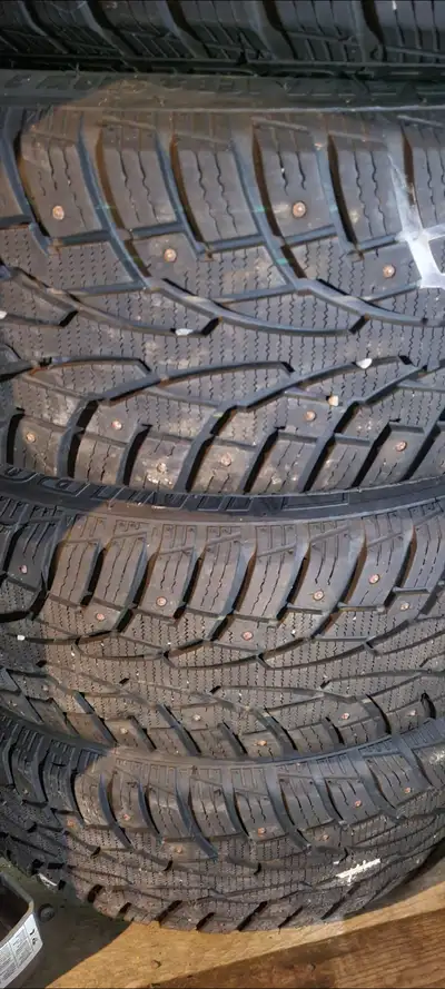 4 winter studded tires on rims,ready to install,like new condition,came off a Toyota Corolla 195/65/...