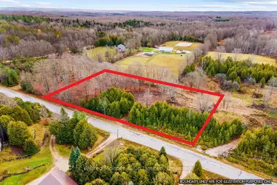 2 acre country buildable lot on a paved road. With easy access to Hwy 6 and only 20 minutes to Owen...