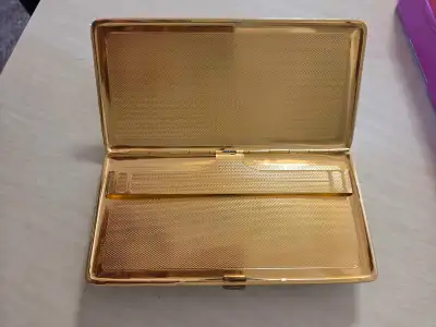 A very attractive leather case made in England. Slim & nice to hold. The case opens very smoothly wh...
