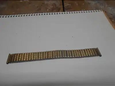 1-BRACELET POUR MONTRE,EN METAL DORE,DE MARQUE FIX-O-FLEX, View more