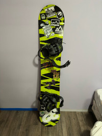 Forum Snowboard with bindings and burton snowboard bag.