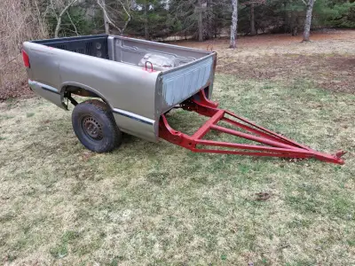 Back half of a gmc sonoma Beat up on the inside from firewood. Frame solid. Not plated Not wired