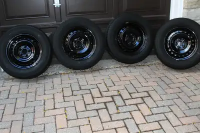 4 Firestone - 215/65/R16 98T M+S - All-Season radials mounted and balanced on steel rims. My 2006 Ni...