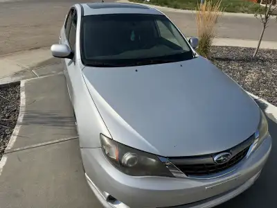 2009 Subaru Impreza, put a decent amount into fixing it, runs well and no issues to my knowledge
