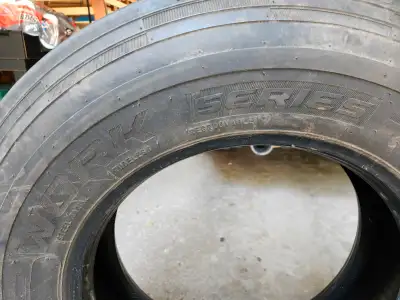 5 Cooper Work Series RHT load range H Tires for sale. Lots of tread with weather checking on some. $...