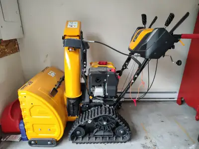 Club Cadet 2X Snowblower with caterpillar-type treads. Mint condition. Used one season (4-5 "blows"...
