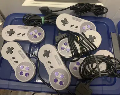 Selling a collection of used Super Nintendo SNES controllers. These controllers are in mint conditio...