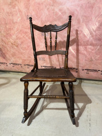 Antique wood rocking chair with leather seat 