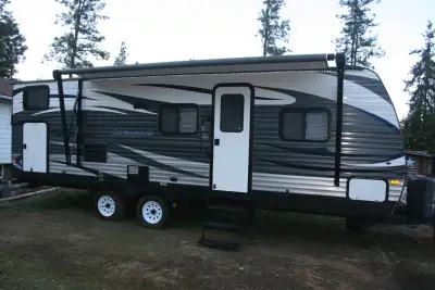 2015 Springdale Trailer has less than a 1,000 road miles on it. Four brand NEW tires, 2 brand NEW pr...