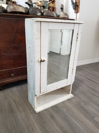 Vintage cabinet beveled mirror 