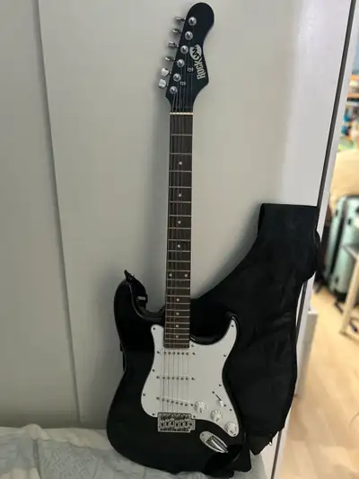 Good Starter Guitar for beginners Everything is functional Comes with case