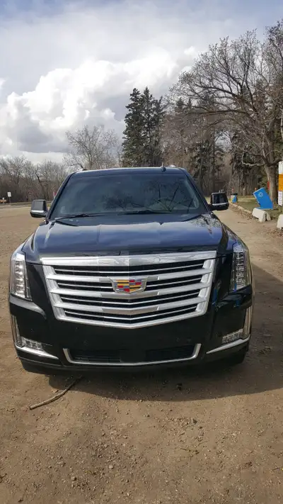 I'm selling my used Cadillac ESV Premium, a luxurious and spacious SUV with top-of-the-line features...