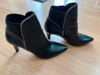 Black leather boots by Tahari $10.00 size 7M