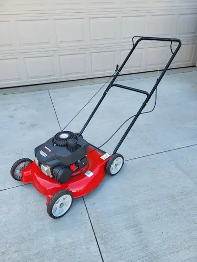 20" Yard Machines pushmower with side discharge only. Powered by a 140cc. OHV Powermore engine. Very...