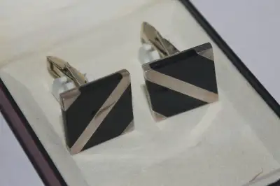 Handsome 925 sterling silver cufflinks with bold stripe black onyx inlay. These cufflinks are pre-ow...