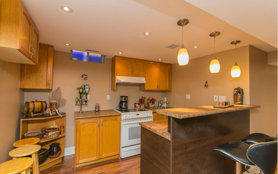 This self-contained basement apartment offers great privacy and everyday convenience in an excellent...