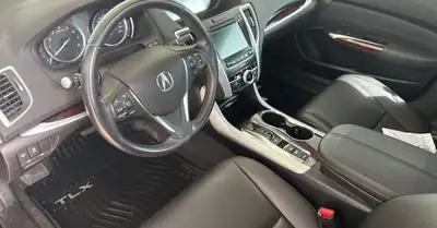Low KM Salvage title, a beautiful Acura tlx sh V6 super handling runs like new. It was hit left rear...