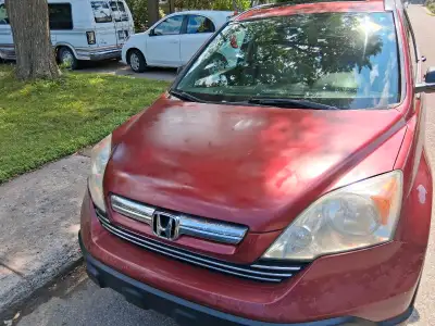 Honda crv 2009 bourgogne avec attache de remorque toit ouvrant électrique bonne condition
