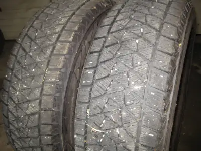 2 P235/65R17 Bridgestone Blizzak DM-V2 winter tire,95% tread left,$250