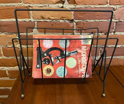 Vintage mid-century metal magazine rack, View more