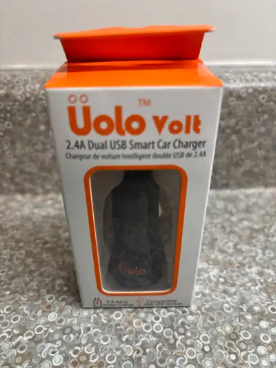 New in unopened package - car cell phone charger purchased from Apple. Compatible with USB devices....