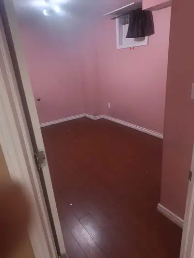 This spacious two-bedroom basement apartment in Brampton features a functional kitchen, comfortable...