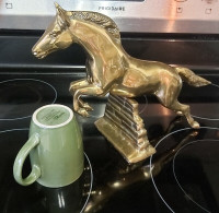 Vintage brass horse jumping fence
