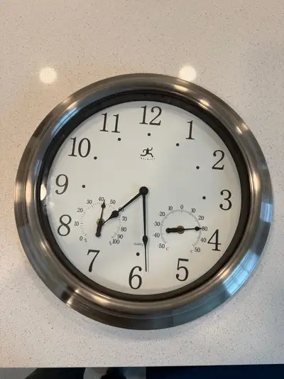 Large wall clock with thermometer and humidity. , View more