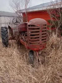 Old tractor for parts or lawn ornament!