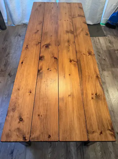 Large wood table for sale. I believe it is made of pine but I could be wrong. 96 in x 37 in Beautifu...