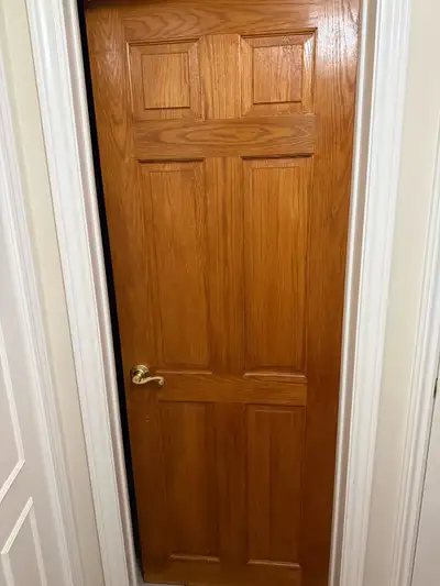 I'm selling a used wooden door, perfect for adding character to any room. This door has a classic de...