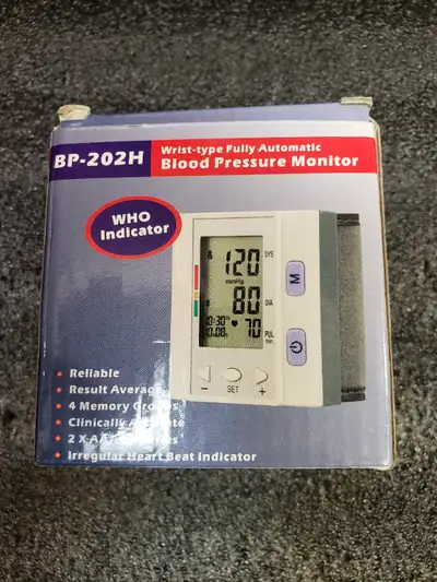 Blood pressure monitor wrist type fully automatic Brand new Takes 2AA batteries $27.00 or trade cord...