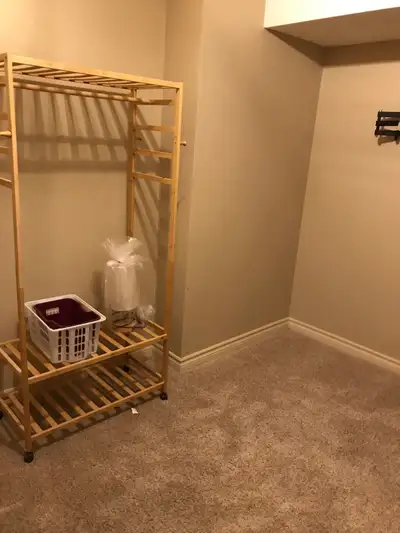 Clean, bright unfurnished room rental. Has clothes rack and tv wall mount. available in quiet respec...