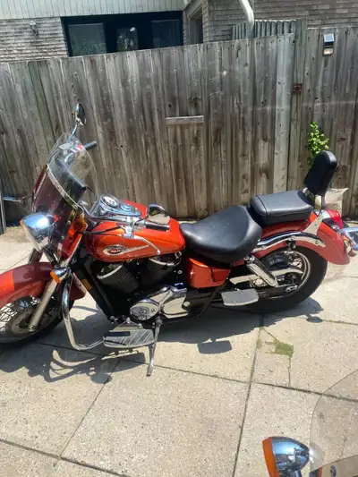 Motorcycle in good condition Orange exterior Milage is in Miles not Km (11764m)