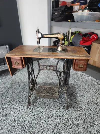 Vintage Singer Treadle Sewing Machine with table. Serial number indicates was manufactured in 1882 -...